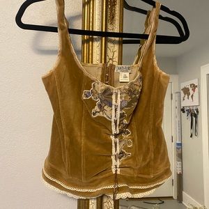 ANTI-FLIRT Corset top with purple floral and white lace details.